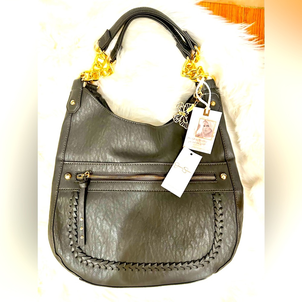 Jessica Simpson awesome bag with the signature butterfly. New with tags